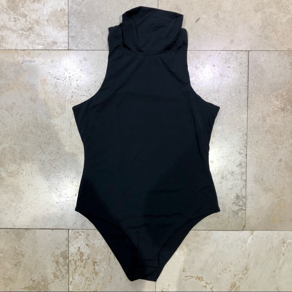 High quality lined block bodysuit with a high neck